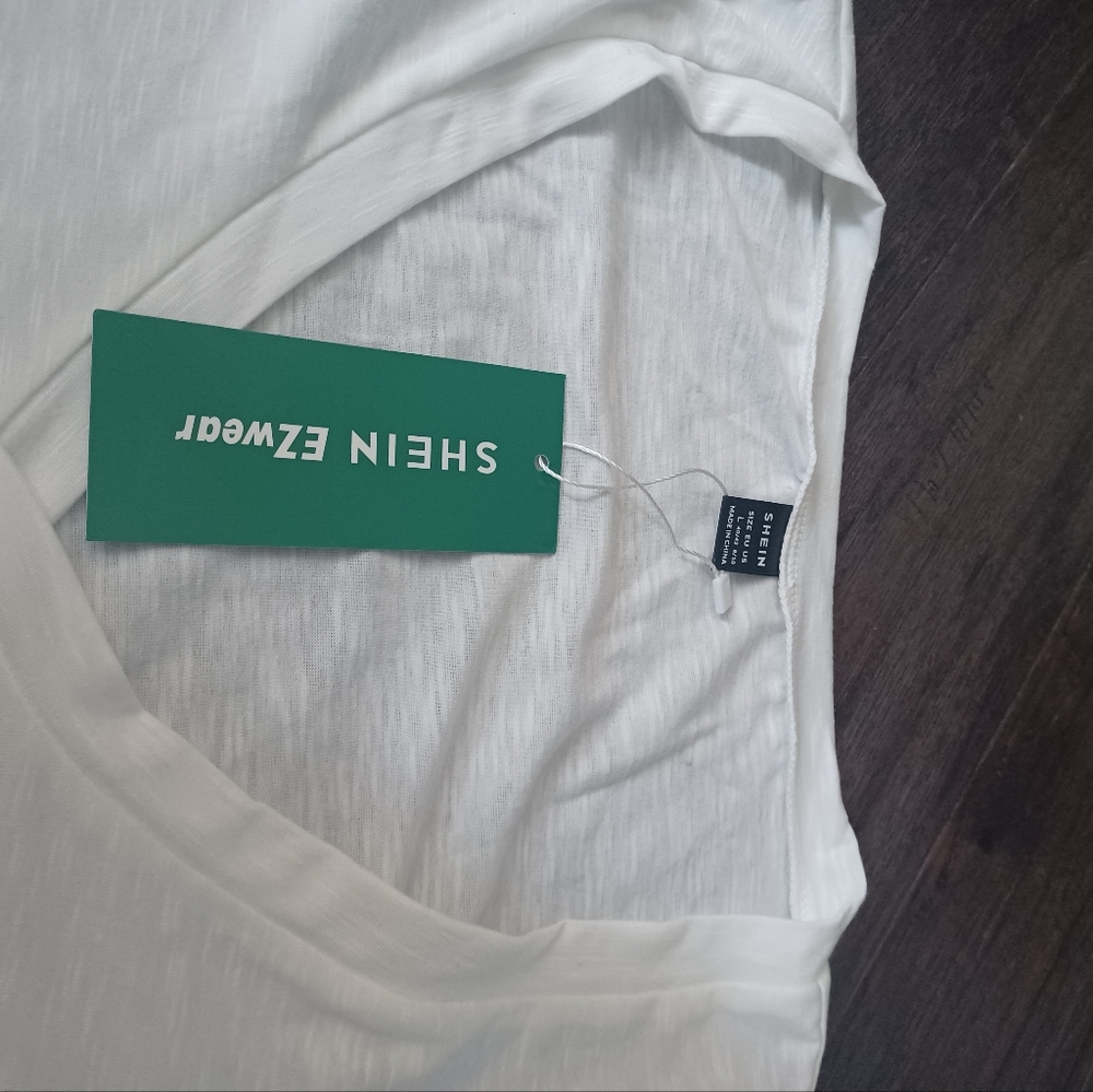 Brand new white tee large